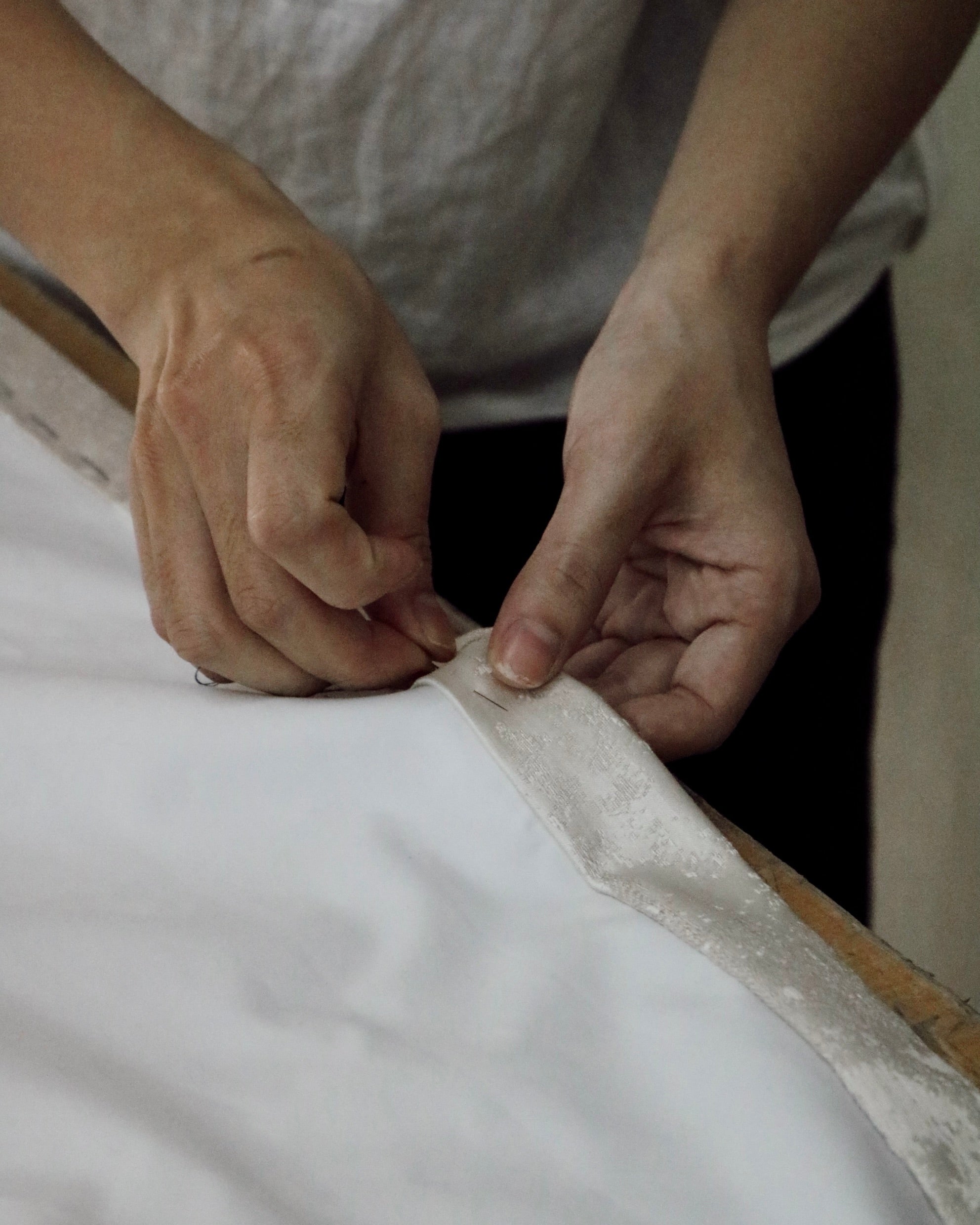 Our drapery is handcrafted in a family-owned workshop in Vietnam,